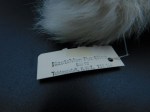 inuit fur leather face tag